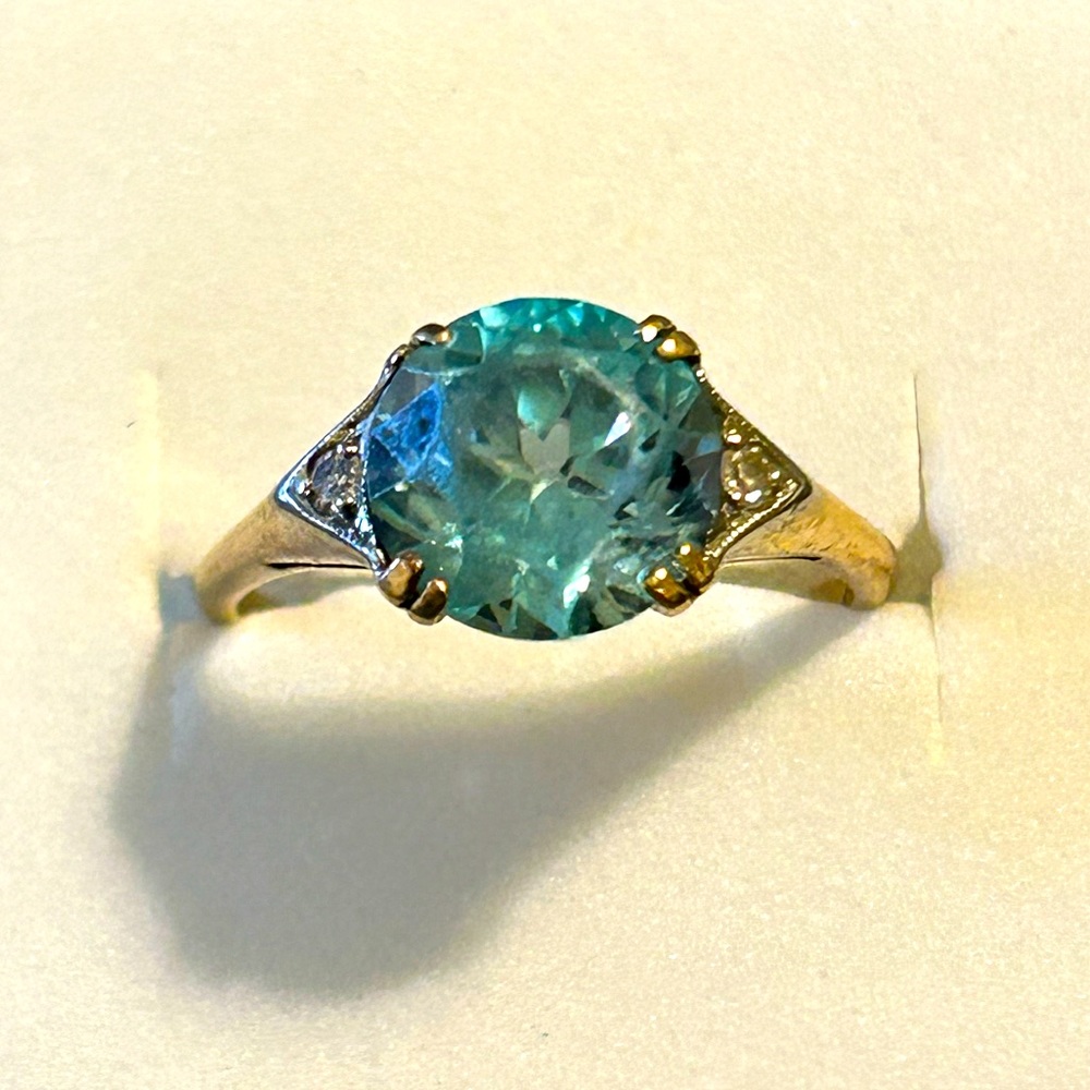 Vintage Gold and Aquamarine Ring with accents.